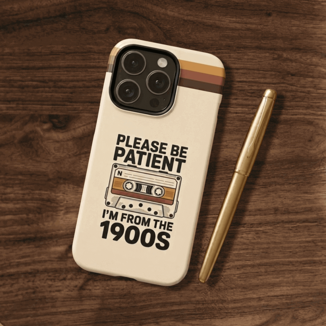 Tough phone case with a vintage cassette tape design on a wooden surface 
