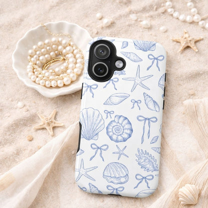 iPhone tough case with blue sea themed design on a sandy background with pearls