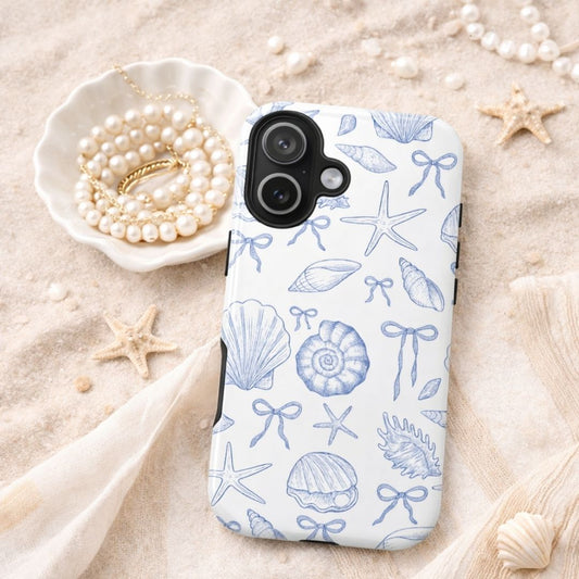 iPhone tough case with blue sea themed design on a sandy background with pearls