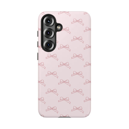 Tough dual-layer case with light pink bow pattern